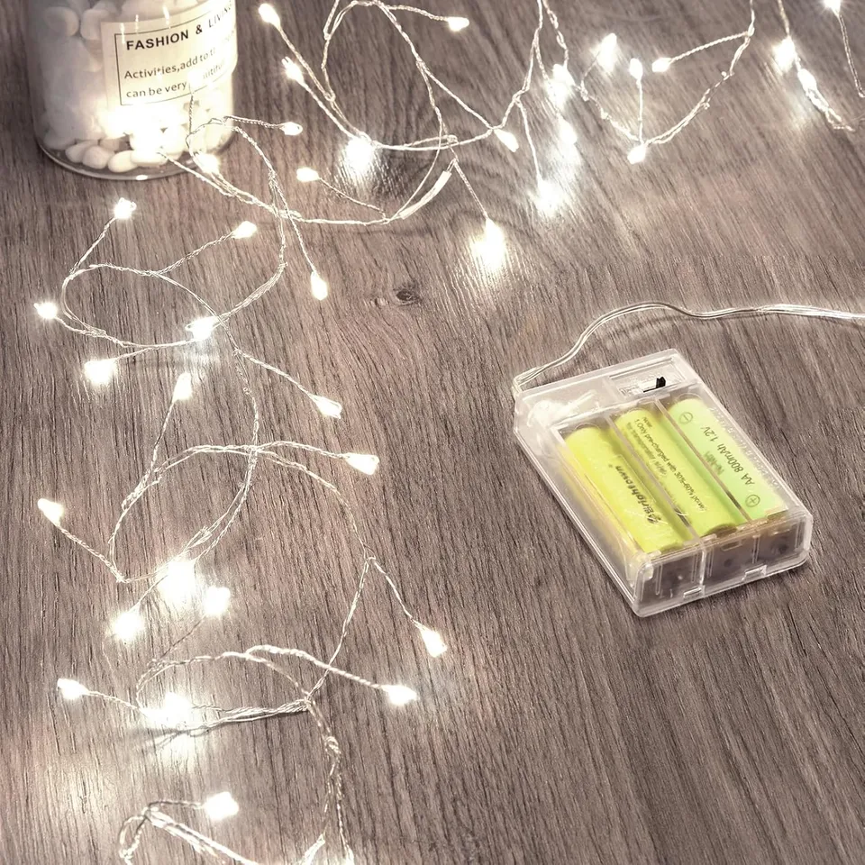 brightown-5ft-battery-operated-60-led-silver-wire-firecracker-cluster-lights-pur image 1