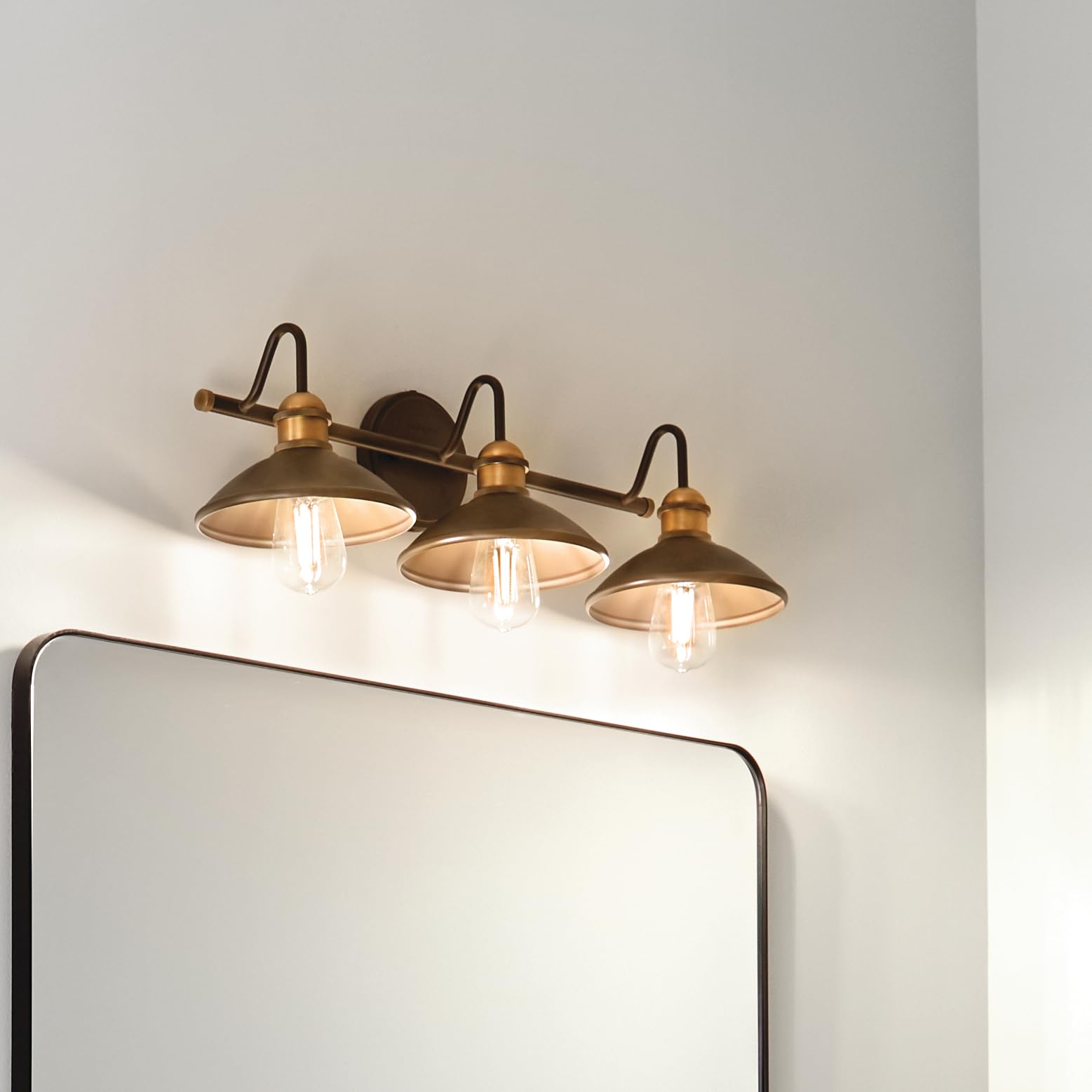 kichler-clyde-3-light-industrial-vanity-light-in-olde-bronze-with-globe-shades image 3