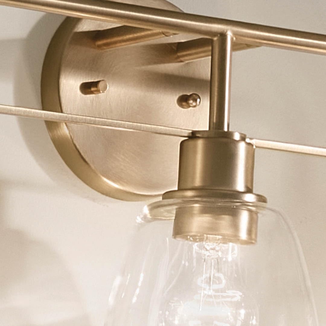 kichler-meller-3-light-industrial-vanity-light-champagne-bronze-with-clear-glass image 8