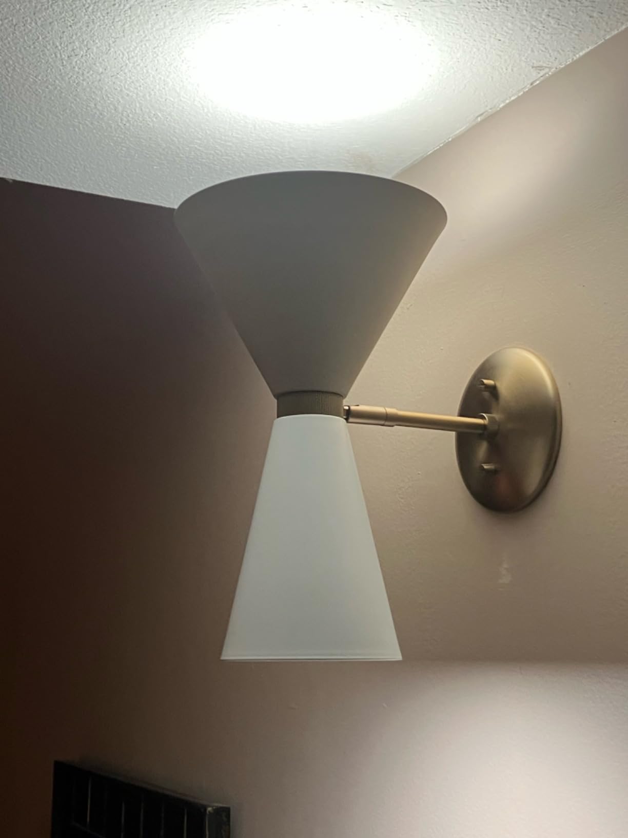 Nice sconces, but shades a bit loose